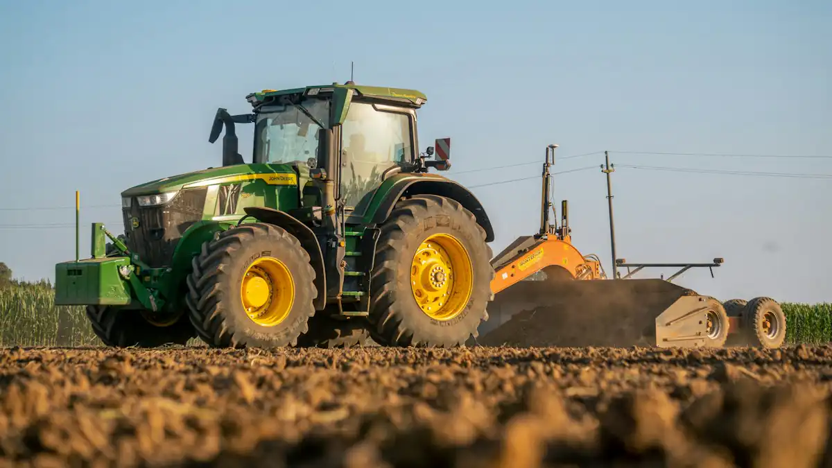 Traktor membajak lahan